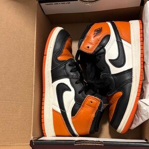 Jordan Kids Black and Orange High-Tops